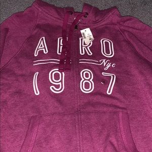 NEW ZIP UP SWEATSHIRT